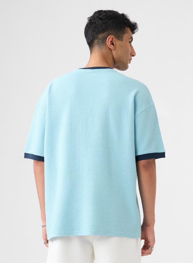 ذا سوليد ستور تيشيرت واسع بتفاصيل بارزة الملمس - Image 4